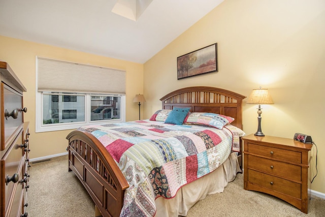 3542 Kirkaldy Cir, Portage, MI 49024 - carpeted bedroom featuring vaulted ceiling and baseboards