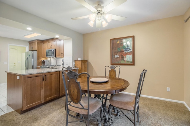 3542 Kirkaldy Cir, Portage, MI 49024 - dining room featuring ceiling fan and light carpet