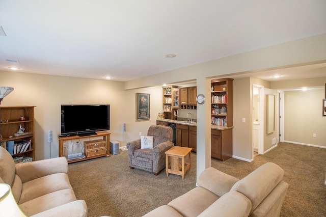 3542 Kirkaldy Cir, Portage, MI 49024 - carpeted living room featuring recessed lighting and bar