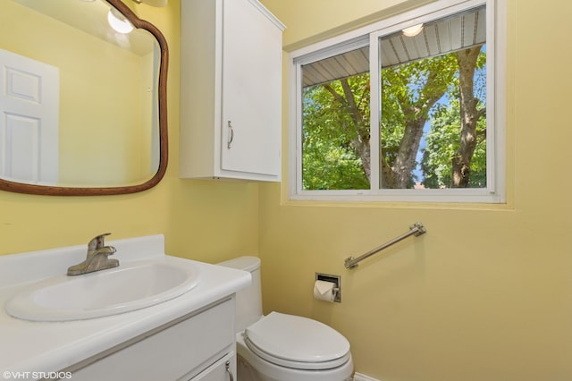 1320 S Manor Dr, Saint Joseph, MI 49085 - half bathroom featuring vanity and toilet