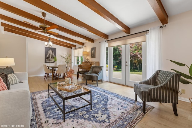 1320 S Manor Dr, Saint Joseph, MI 49085 - living room with wood finished floors, french doors, and ceiling fan