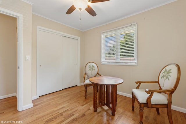 1320 S Manor Dr, Saint Joseph, MI 49085 - sitting room with light wood-style floors, ceiling fan, and crown molding