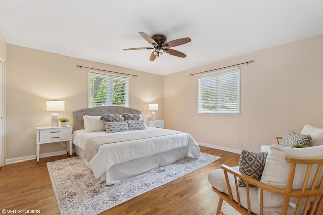 1320 S Manor Dr, Saint Joseph, MI 49085 - bedroom with light wood finished floors and a ceiling fan