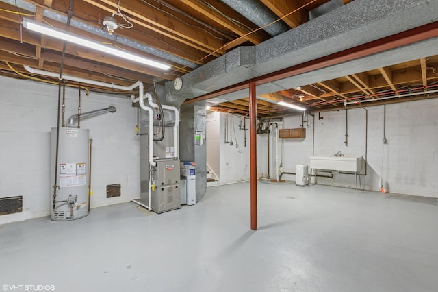 1320 S Manor Dr, Saint Joseph, MI 49085 - unfinished basement with water heater, heating unit, and concrete block wall