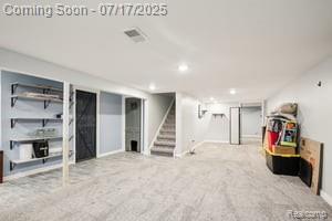 402 Thomas Ln, Grand Blanc, MI 48439 - finished below grade area featuring stairs, recessed lighting, and carpet floors