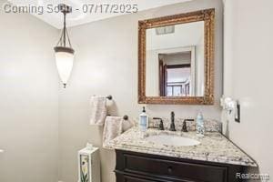 402 Thomas Ln, Grand Blanc, MI 48439 - bathroom featuring vanity and toilet