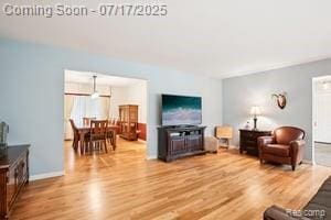 402 Thomas Ln, Grand Blanc, MI 48439 - living area featuring wood finished floors