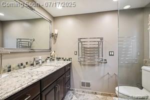 402 Thomas Ln, Grand Blanc, MI 48439 - full bath featuring vanity, recessed lighting, and a shower with door