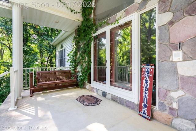 8808 Big Lake Rd, Clarkston, MI 48346 - porch featuring french doors