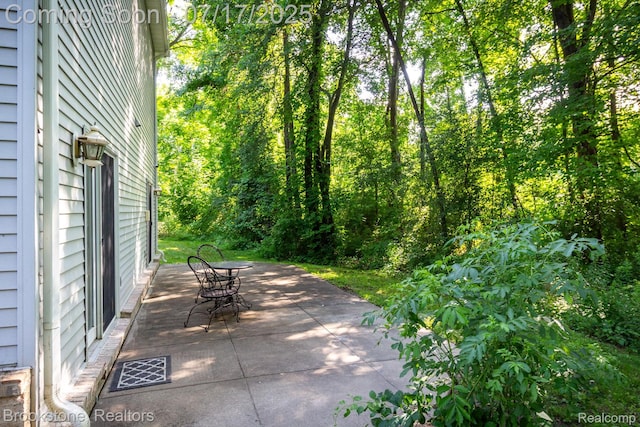 8808 Big Lake Rd, Clarkston, MI 48346 - view of patio featuring outdoor dining area
