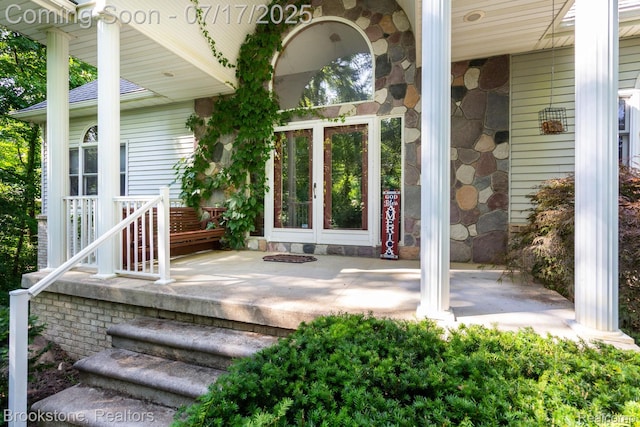 8808 Big Lake Rd, Clarkston, MI 48346 - view of exterior entry featuring french doors