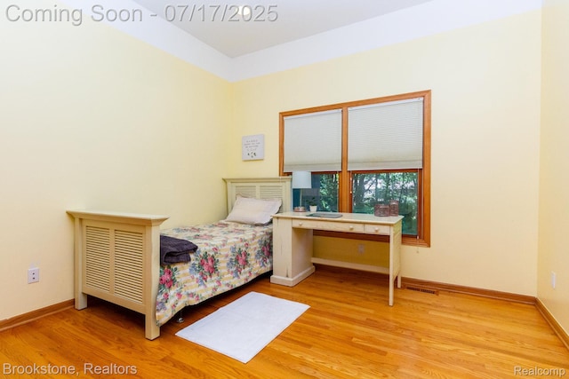 8808 Big Lake Rd, Clarkston, MI 48346 - bedroom with wood finished floors and baseboards