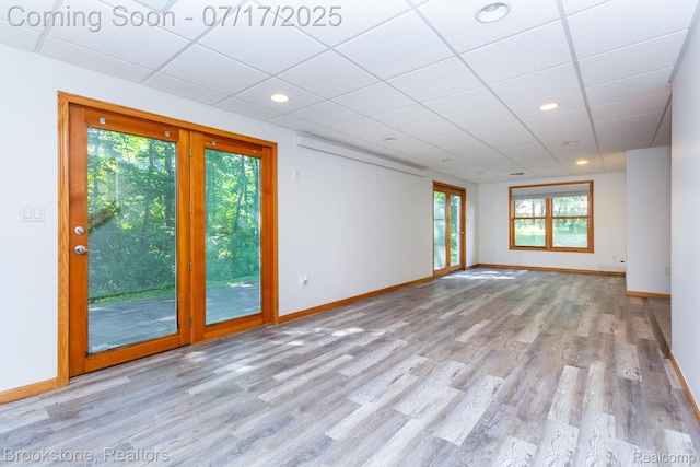 8808 Big Lake Rd, Clarkston, MI 48346 - unfurnished room with wood finished floors, recessed lighting, and a drop ceiling