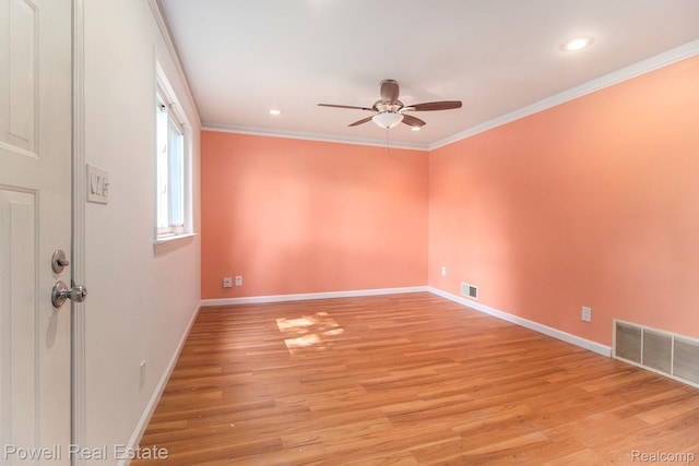 7642 Arcola Ave, Westland, MI 48185 - spare room with a ceiling fan, light wood finished floors, recessed lighting, and crown molding