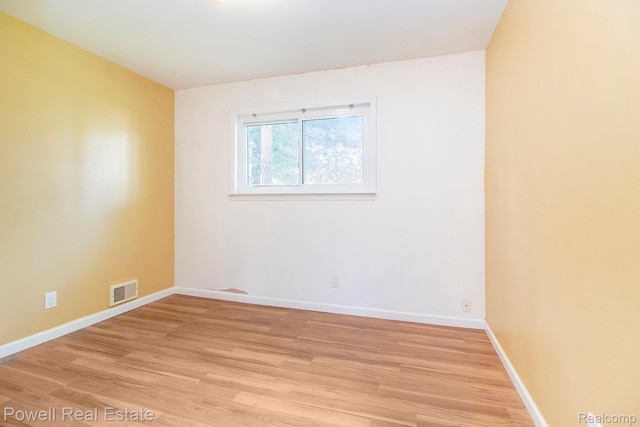 7642 Arcola Ave, Westland, MI 48185 - empty room with light wood-style floors