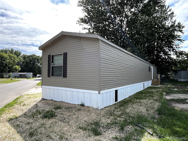 8499 LOT214 E M 71, Durand, MI 48429 - view of side of home