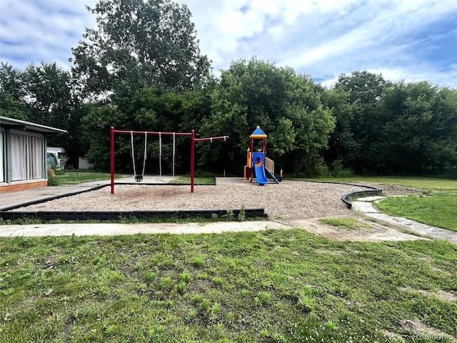 8499 LOT214 E M 71, Durand, MI 48429 - community playground with a lawn