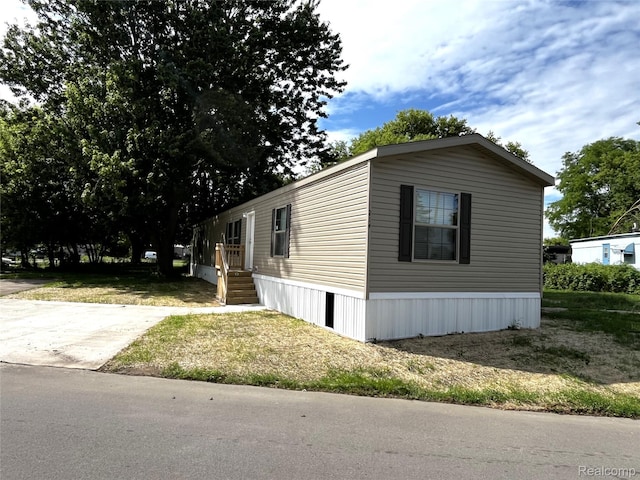 8499 LOT214 E M 71, Durand, MI 48429 - view of front facade