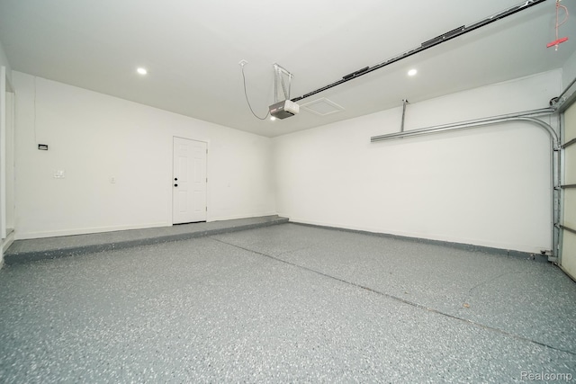 45293 Heatherwoode Ln, Macomb, MI 48044 - garage with a garage door opener and recessed lighting