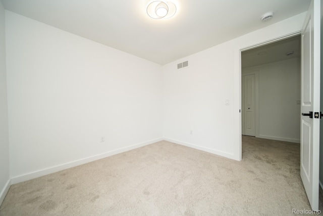 45293 Heatherwoode Ln, Macomb, MI 48044 - carpeted empty room with baseboards and a smoke detector