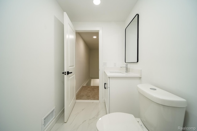 45293 Heatherwoode Ln, Macomb, MI 48044 - bathroom featuring marble look tiles, vanity, and recessed lighting
