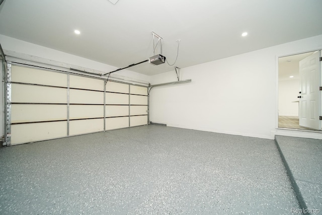 45293 Heatherwoode Ln, Macomb, MI 48044 - garage with a garage door opener and recessed lighting