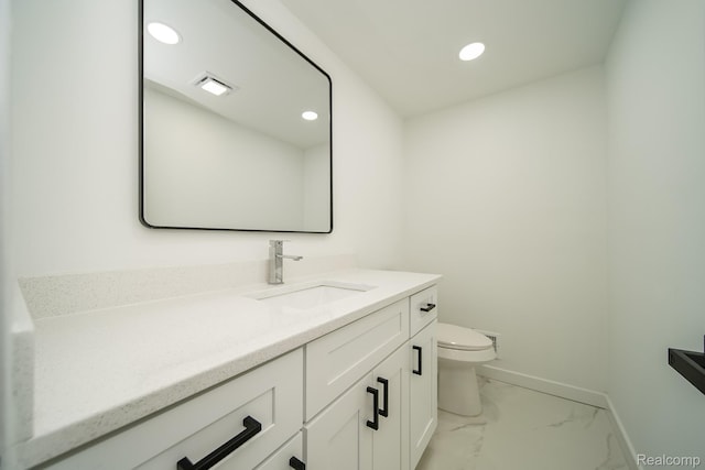 45293 Heatherwoode Ln, Macomb, MI 48044 - bathroom featuring marble look tiles, vanity, and recessed lighting