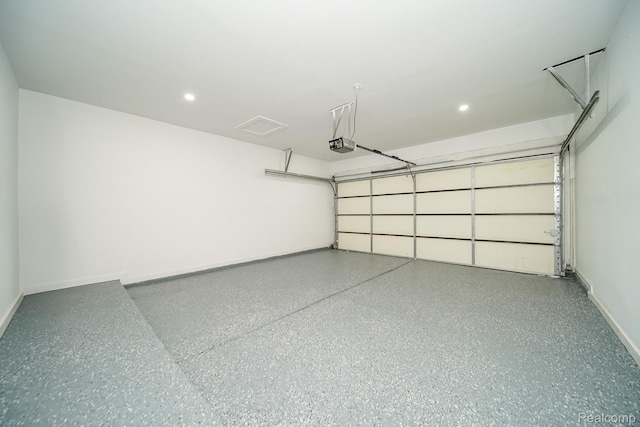 45293 Heatherwoode Ln, Macomb, MI 48044 - garage featuring a garage door opener and recessed lighting