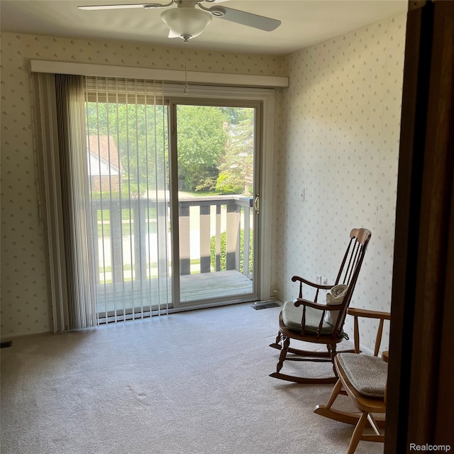 44736 Lynn Dr, Plymouth, MI 48170 - living area with wallpapered walls, a ceiling fan, carpet floors, and plenty of natural light