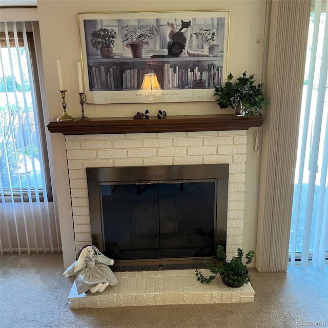 44736 Lynn Dr, Plymouth, MI 48170 - detailed view of carpet floors and a brick fireplace