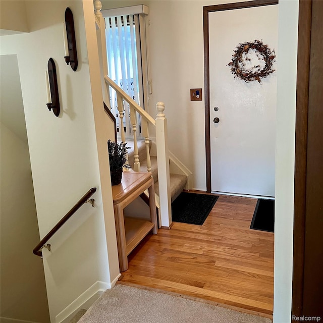 44736 Lynn Dr, Plymouth, MI 48170 - foyer featuring light wood-style flooring and stairway