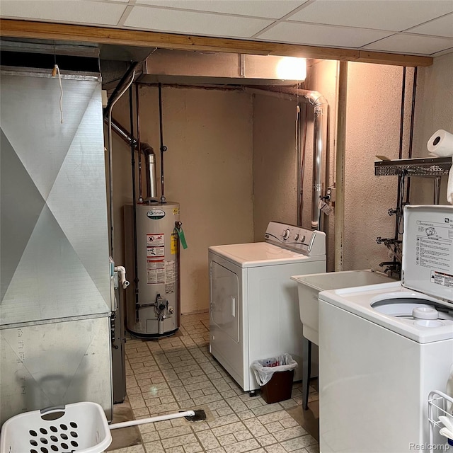 44736 Lynn Dr, Plymouth, MI 48170 - washroom with water heater, separate washer and dryer, and brick patterned flooring