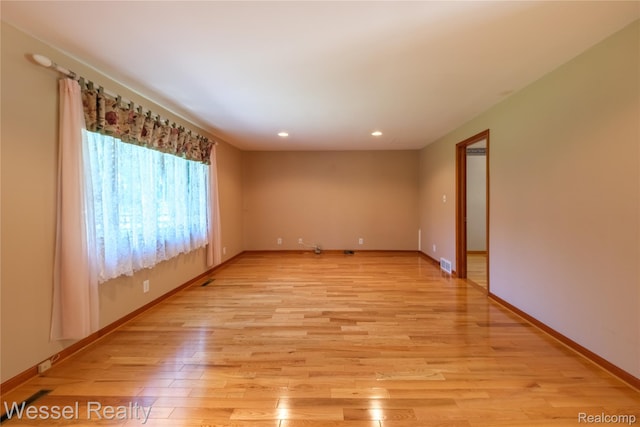 2465 Texter Rd, Leonard, MI 48367 - unfurnished room featuring light wood finished floors and recessed lighting