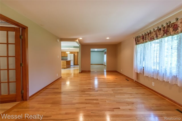 2465 Texter Rd, Leonard, MI 48367 - spare room with light wood-type flooring and recessed lighting