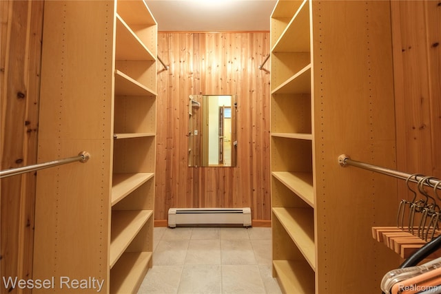 2465 Texter Rd, Leonard, MI 48367 - walk in closet featuring a baseboard heating unit and tile patterned floors
