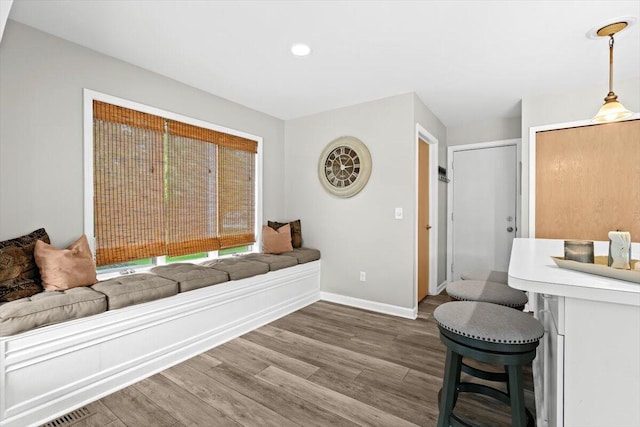 1683 Majon Dr, Highland, MI 48356 - living room featuring wood finished floors and recessed lighting