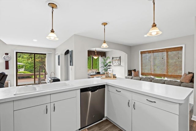 1683 Majon Dr, Highland, MI 48356 - kitchen featuring dishwasher, open floor plan, and light countertops
