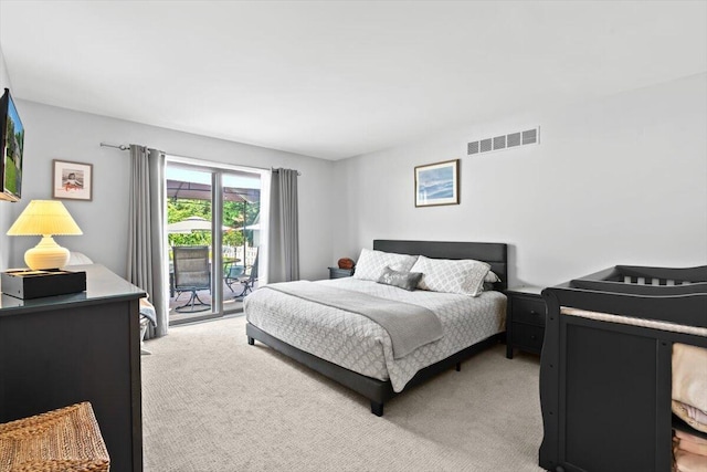 1683 Majon Dr, Highland, MI 48356 - bedroom featuring light carpet and access to exterior