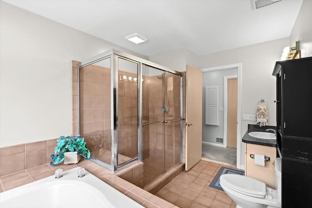 1683 Majon Dr, Highland, MI 48356 - full bath with a shower stall, a garden tub, vanity, and tile patterned floors