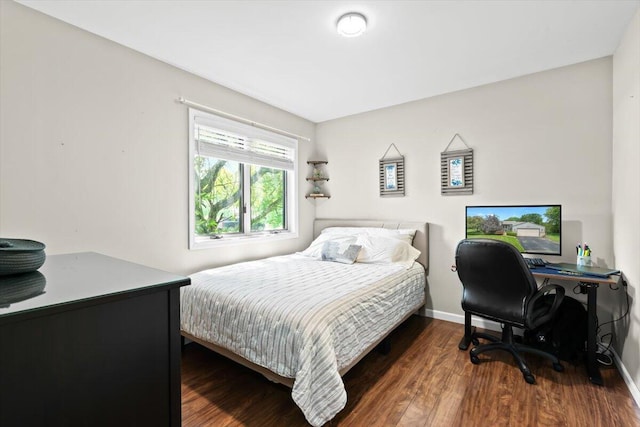 1683 Majon Dr, Highland, MI 48356 - bedroom with wood finished floors and a desk