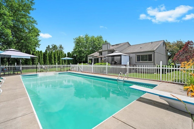 1683 Majon Dr, Highland, MI 48356 - view of pool featuring a diving board and a patio area