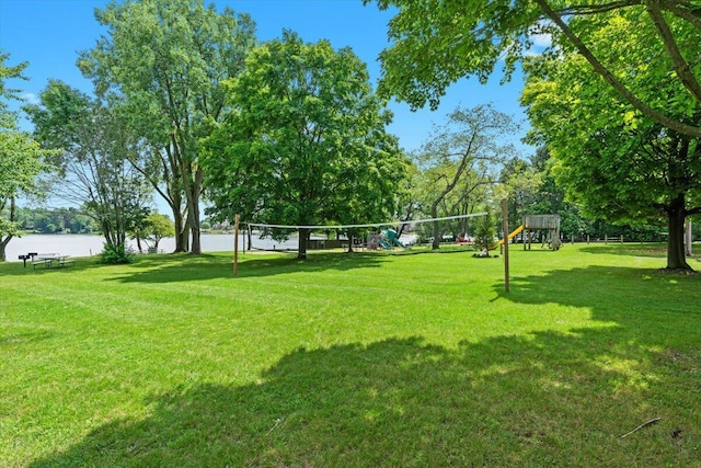 1683 Majon Dr, Highland, MI 48356 - view of home's community featuring a yard, volleyball court, and a water view