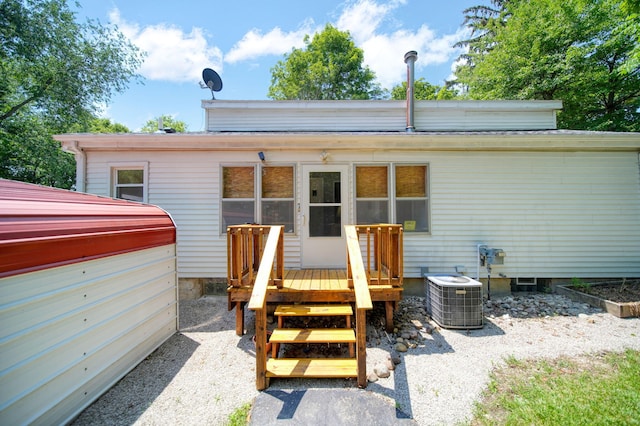 1533 E Munger Rd, Tecumseh, MI 49286 - rear view of house with a hot tub