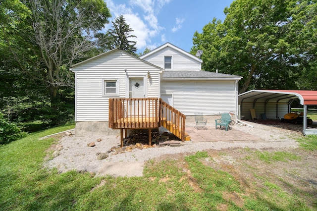 1533 E Munger Rd, Tecumseh, MI 49286 - back of property featuring a detached carport and a yard