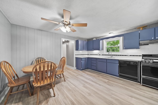 1533 E Munger Rd, Tecumseh, MI 49286 - kitchen with dishwasher, range with electric stovetop, blue cabinetry, under cabinet range hood, and a textured ceiling