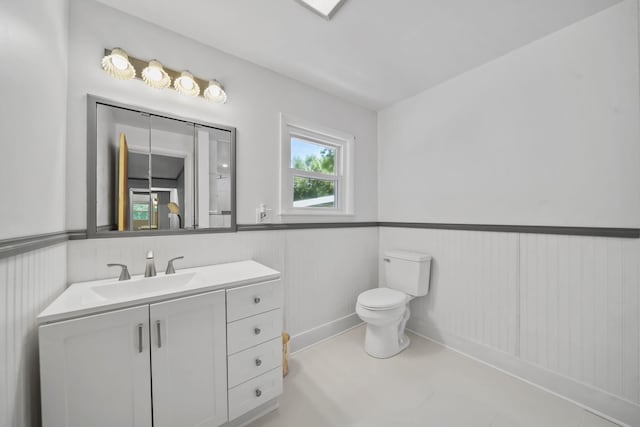1533 E Munger Rd, Tecumseh, MI 49286 - bathroom featuring vanity and a wainscoted wall
