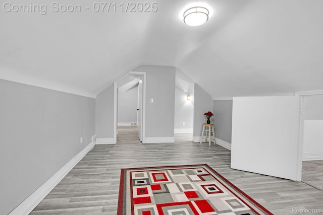 24370 Eureka Ave, Warren, MI 48091 - additional living space with wood finished floors and lofted ceiling