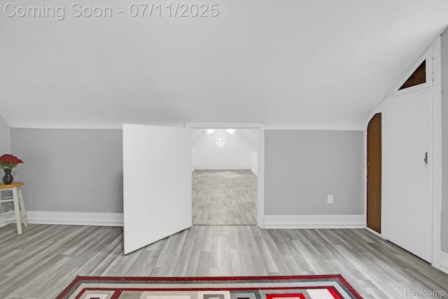24370 Eureka Ave, Warren, MI 48091 - additional living space with wood finished floors and lofted ceiling