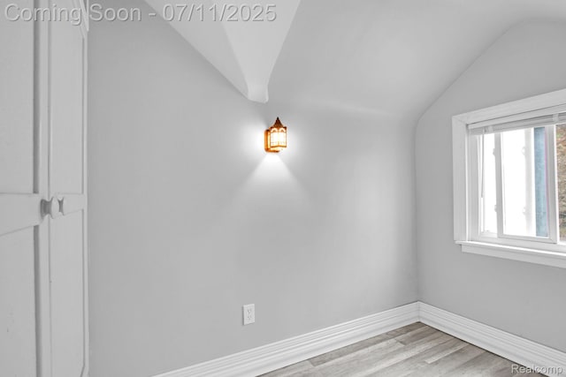 24370 Eureka Ave, Warren, MI 48091 - unfurnished room featuring lofted ceiling and light wood-style floors