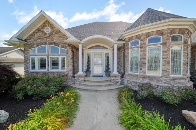 8321 Odowling Dr, Onsted, MI 49265 - view of front of property featuring stone siding and roof with shingles